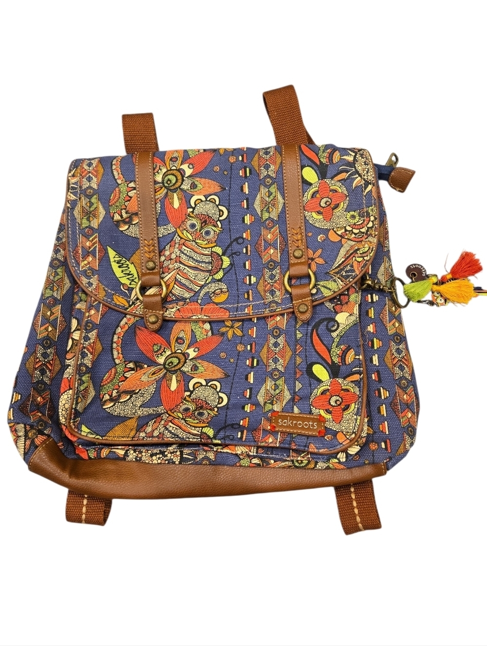 SAKROOTS ARTIST COVERTIBLE BACKPACK FEATURING OWLES AND A FLORAL PRINT.
